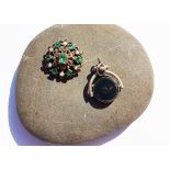 A 19th Century Austo-Hungarian emerald and seed pearl target brooch, with foil back, emerald and