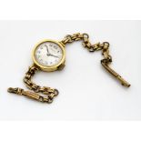 A c1930s Rolex 18ct gold cased lady~s wristwatch, 20mm circular case, appears to run, on a 9ct