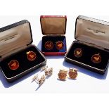 A set of three farthing cufflinks, a pair of silver gilt oval cufflinks and a textured silver set,