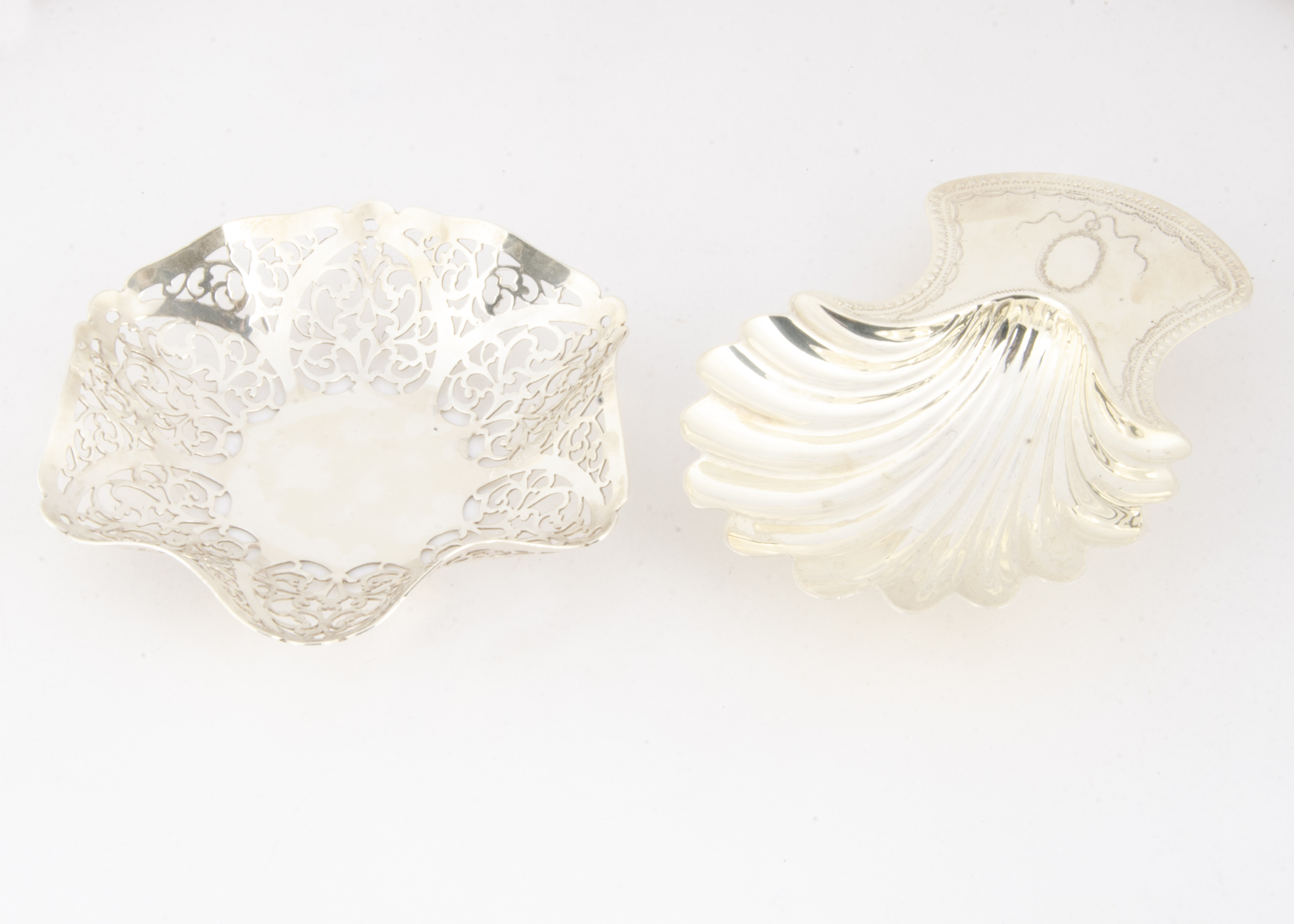 Two 1970s silver items, including a shell shaped dish and a pierced hexagonal dish, 7.1 ozt