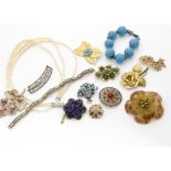 A large quantity of various early and late 20th Century costume jewels, including beads, brooches,