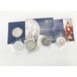 Five modern 1oz fine silver £2 coins, one 2012 in card packet, two 1999 in sealed bags, a 2001 and a