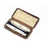 A George III silver and mother of pearl campaign folding knife and fork set, presented in a fitted