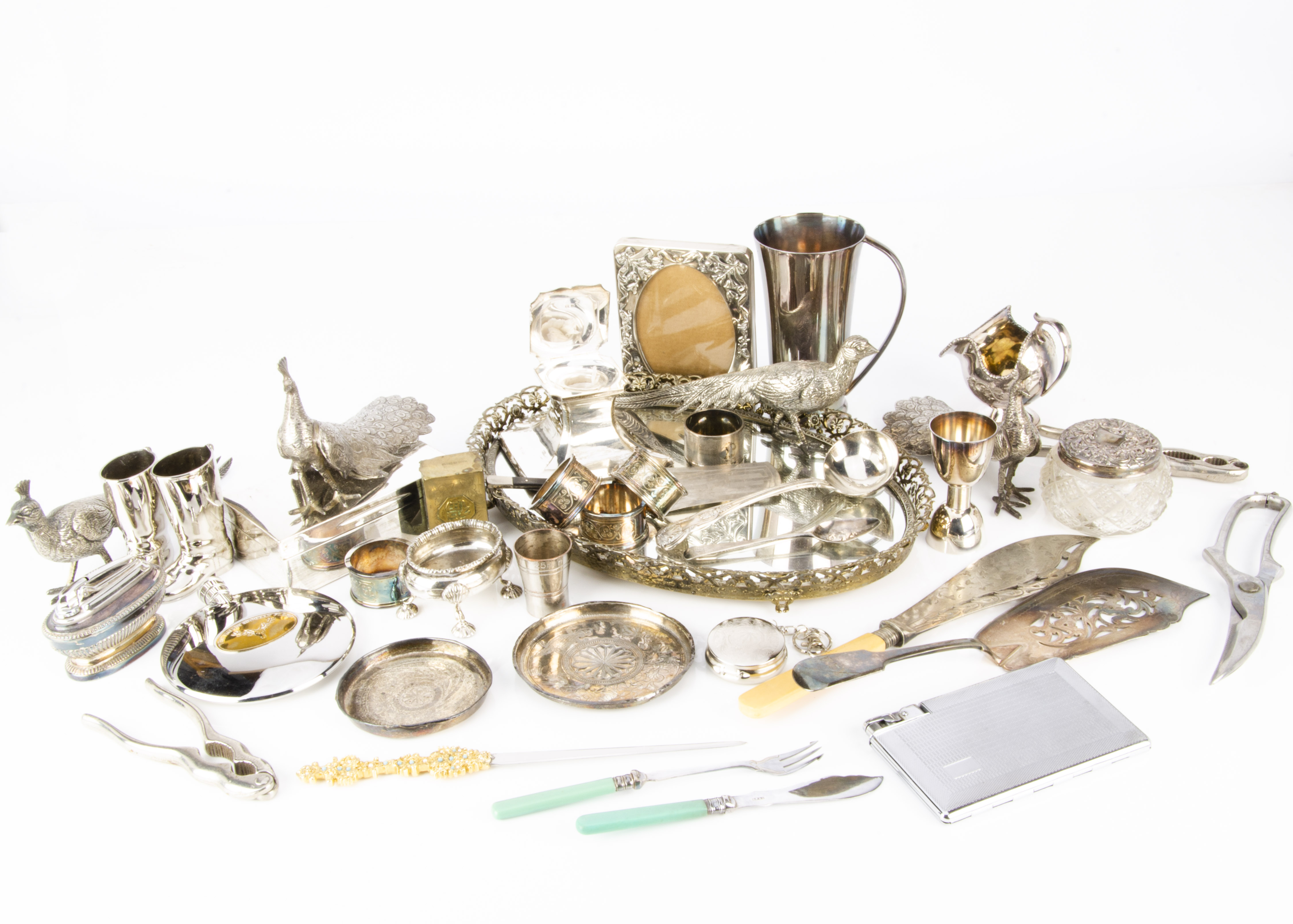 A collection of silver and silver plate, including an Art Deco silver cigarette box and inkwell, a