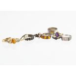 A collection of gold and silver rings, including 9ct gold amethyst dress ring, a 9ct gold diamond