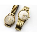Two vintage 9ct gold cased gentlemen~s wristwatches, one from Garrard with engraved inscription to