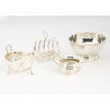 Five items of Victorian and 20th Century silver, including a sugar basin, a cream jug, a spoon, a