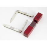 A George III silver and mother of pearl campaign folding knife and fork set, with red card box
