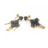 A pair of Edwardian Irish bog oak and gilt metal screw back drop earrings, the carved oak screw back