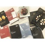 A collection of 26 Royal Mint UK Uncirculated Proof coins sets and other Proof coins, dating from