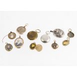 A collection of white metal, silver plated, gold framed and plated lockets, including an Indian