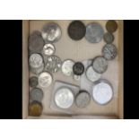 A small collection of coins, including a US 1923 dollar and five other US coins, a silver five pound