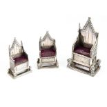 A set of three George V coronation miniature silver throne pin cushions by L&S, London 1910, each