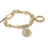 An Edwardian 15ct marked turquoise and seed pearl bracelet, the knotted links with alternate set