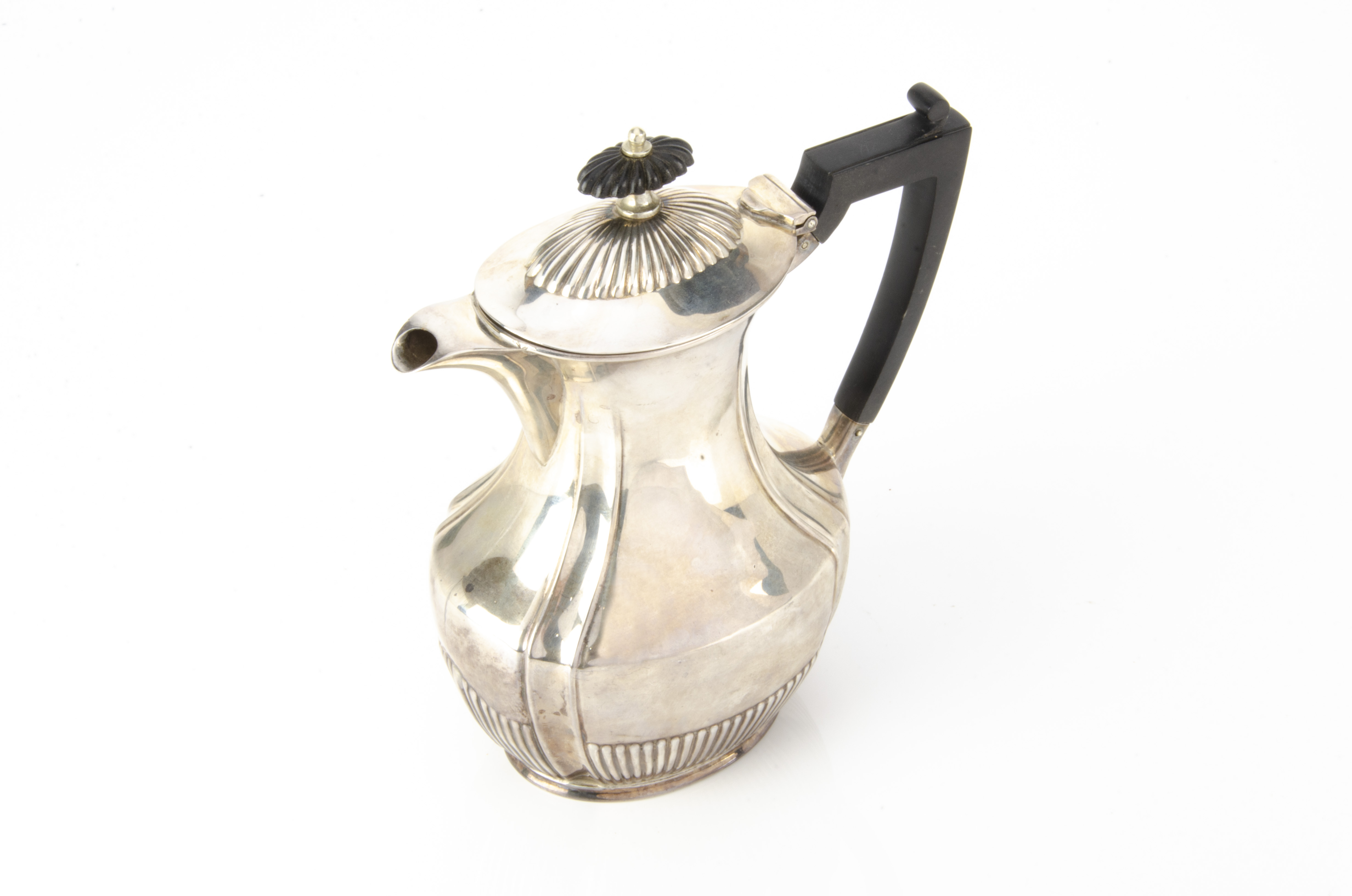 An Edwardian silver hot water jug, Sheffield 1905, 11.9 ozt, retailed through Wyatt in Bournemouth