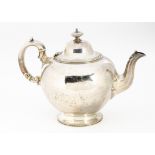 A Victorian silver teapot by Edward Barnard & John Barnard, circular on socle base, London 1861,