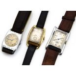 Three Art Deco and later gentlemens wristwatches, including a gold plated Bulova, 24mm wide case,