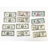 United States of America bank notes and Disney notes, including two $1 with consecutive numbers, two
