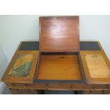 A 19th Century mahogany veneered pedestal writing desk, with moulded top, and lift up central