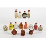 A quantity of Chinese snuff bottles, to include cinnabar lacquer examples, cameo glass, a wooden