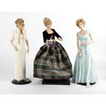 Three Princess Diana china dolls, dressed in memorable outfits, probably Franklin Mint, height