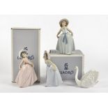 Four Lladro figures, comprising 6175 'White Swan', 6276 'Iris', 6274 'Daisy' and 6275 'Rose', all in