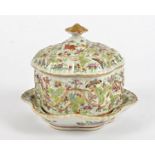 A 19th Century Chinese Famillle Rose shaped tureen, with domed cover and stand, the body of the
