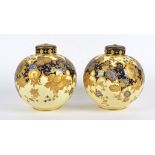 A pair of 19th Century Royal Crown Derby lidded vases, ovoid form, gilt floral decoration on a