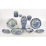 A collection of blue and white porcelain, including two vases (one AF), two bowls, three plates, two