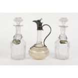 A pair of 20th Century glass decanters, moulded glass with stoppers, with 'Whiskey' and 'Claret'