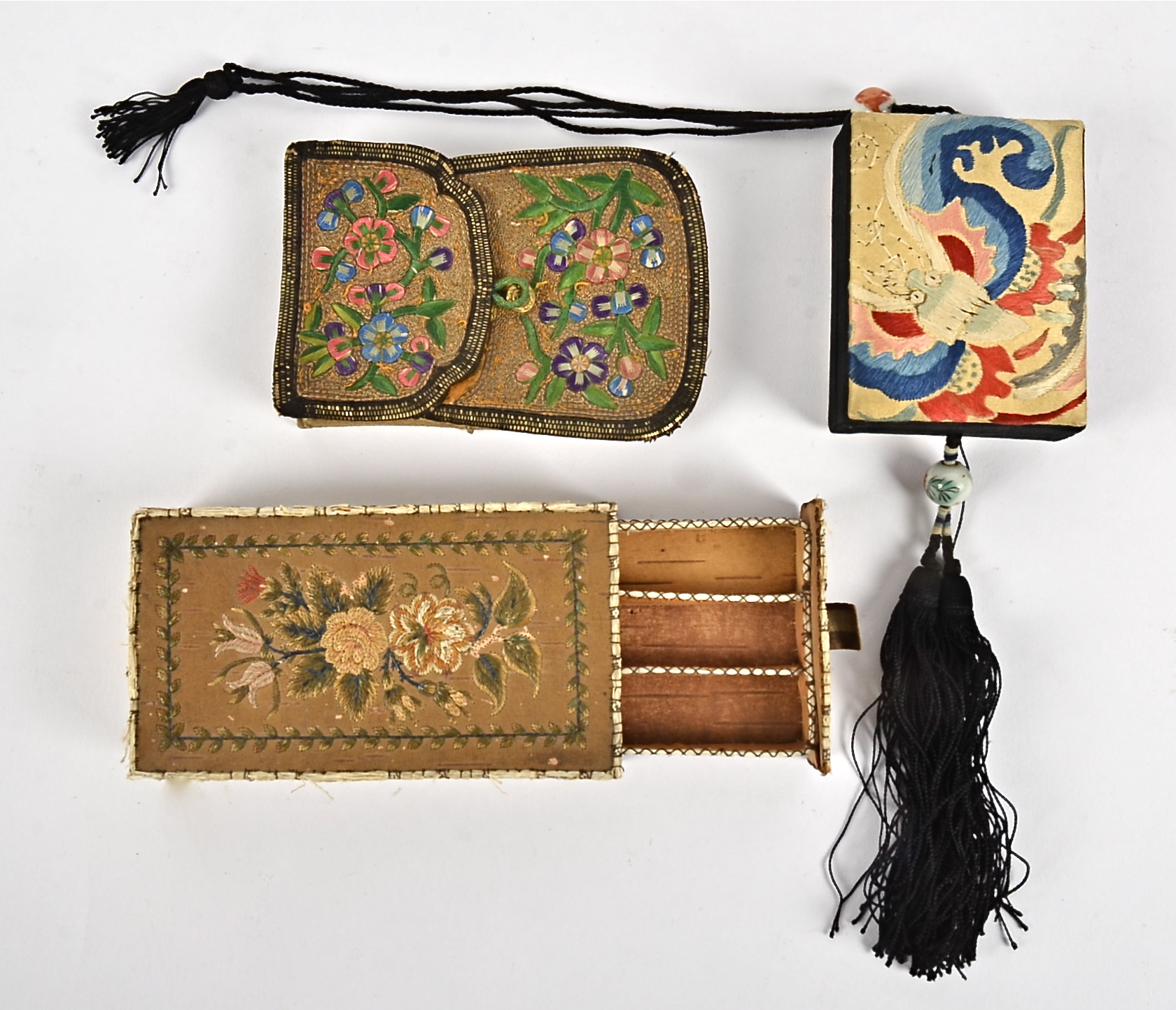 A 19th Century Chinese pouch purse, embroidered with flowers and foliage, 12cm x 9cm, together