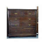 A late 19th Century mahogany chest of drawers, moulded top with canted corners to the top and sides,