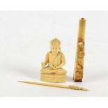 A late 19th or early 20th Century ivory figure of a Buddha, 5.5cm, together with a 1920s cheroot