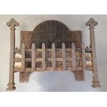 A 19th Century cast iron fire castle and portcullis style fire grate, width 58cm x depth 30cm x