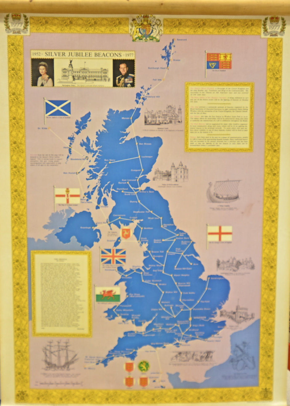 Two commemorative posters on wood and metal supports one with hallmarked silver mounts, the ends - Image 2 of 2