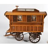 A wooden gypsy caravan by Robin Wilson, 49cm x 46cm x 26cm