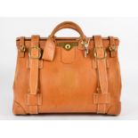 A tan leather Dunhill Gladstone bag, two large and two small fatsening straps with lock and keys,