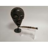 A Chockwe mask, Angola, length 30cm with an Algerian jimbaya knife (2)