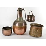 A collection of Zanzibar copper items, including bowls, pans and jugs, some with moulded and