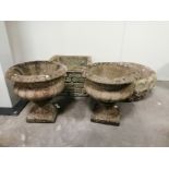 Four garden stone ornaments, including two campagna style urns, height 35cm, diameter 35cm, together