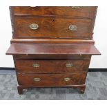 A mahogany George III chest on chest, top section with two short and three long graduated drawers,