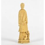 A Chinese marine ivory carving of a lady with an umbrella, probably walrus, with a young child and