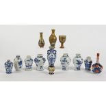 A quantity of Chinese and Japanese bottles, one of lobed form with long Eliza pattern, height