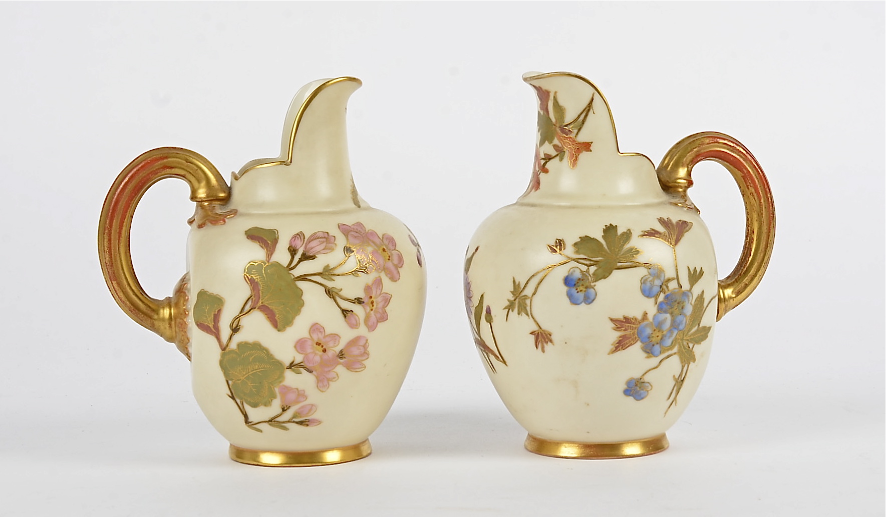 A pair of Royal Worcester flat-back jugs, each with with gold gilt and floral decoration on a - Image 2 of 3