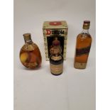 Scottish Whisky and Liqueur, three bottles: a boxed 26? fl. oz. bottle of Dimple whisky (