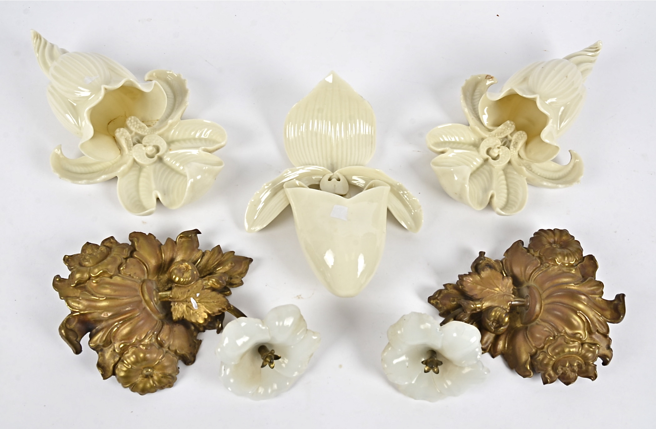 A pair of French ormolu wall sconces, modelled as a flower emerging from shrubs, height 22cm,