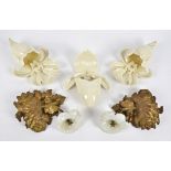 A pair of French ormolu wall sconces, modelled as a flower emerging from shrubs, height 22cm,