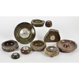 A group of serpentine stone ware collectables, including barometers and compasses, diameter f