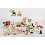 A large collection of pig figurines and ephemera, in glass, pottery, ceramic, resin and metal and