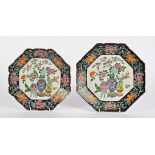 Two 19th Century Asian octagonal plates, both decorated with central scenes of three vases filled